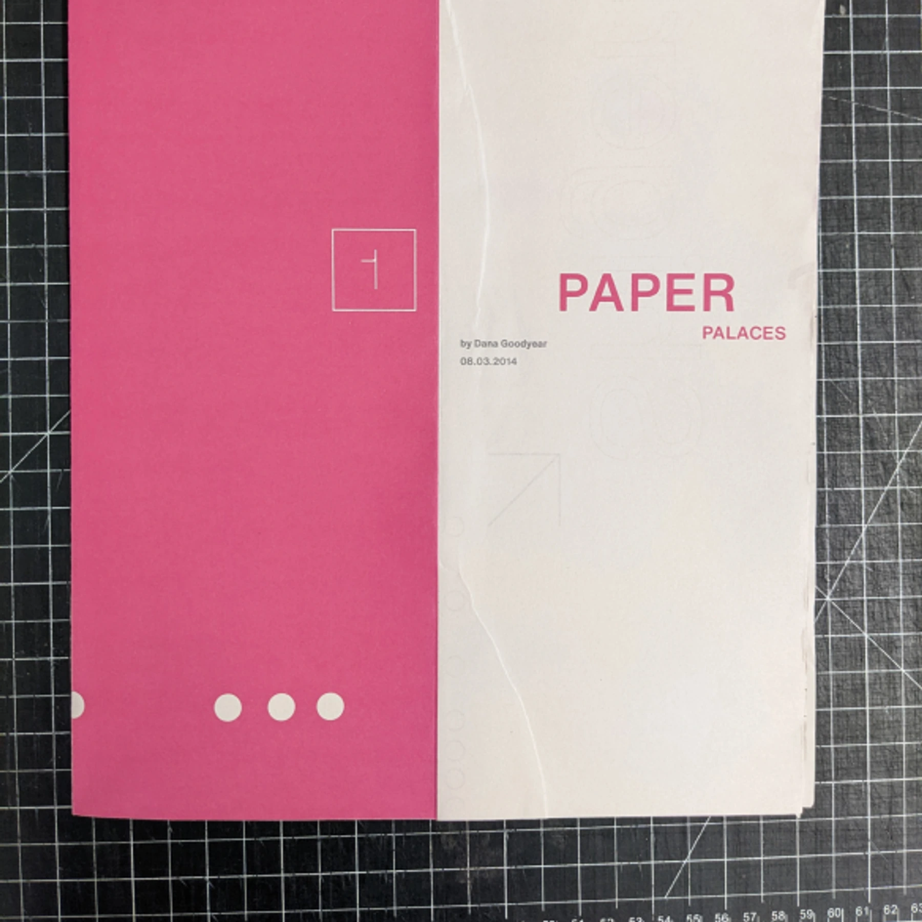 Paper Palaces cover with magenta panel and white paper section on a gridded mat.